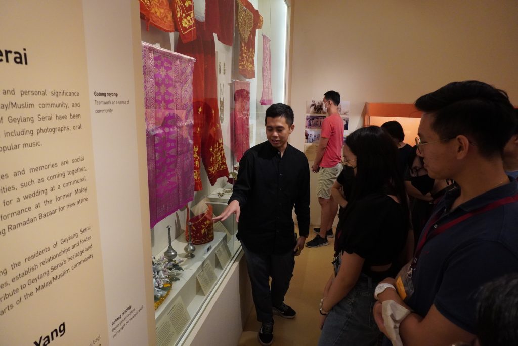 Mr Sufiyan Hanafi, a member of the curatorial team that conceptualised and installed the exhibits at the Geylang Serai Heritage Gallery, describing an exhibit called the mas kawin or mahar, a gift from the groom to the bride to symbolise the former’s responsibility to the latter.